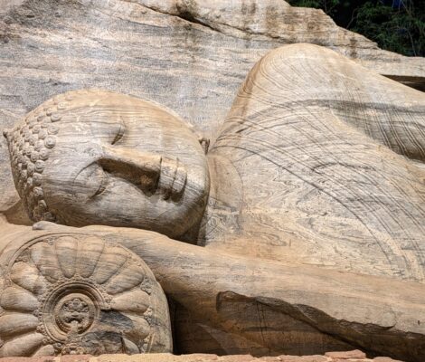 Detailed carving in sculpture of lying Buddha at Polonnaruwa, Sri Lanka