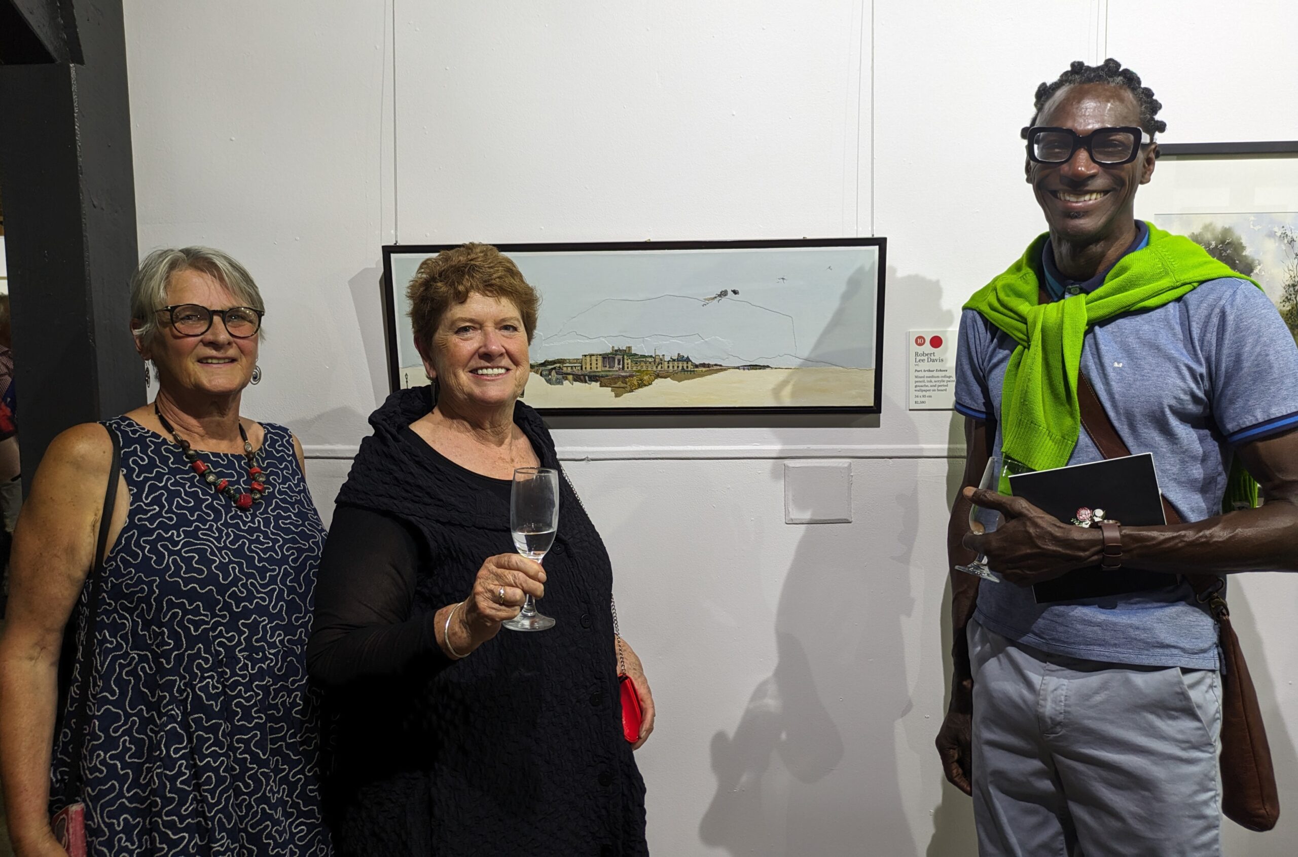 Robert Lee Davis beside his Glover Prize entry. With another finalist, Chantale Delrue and writer, Marjie Courtis