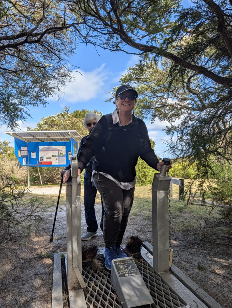 The writer at a footwear-cleaning station. Strzelecki National Park, Flinders Island